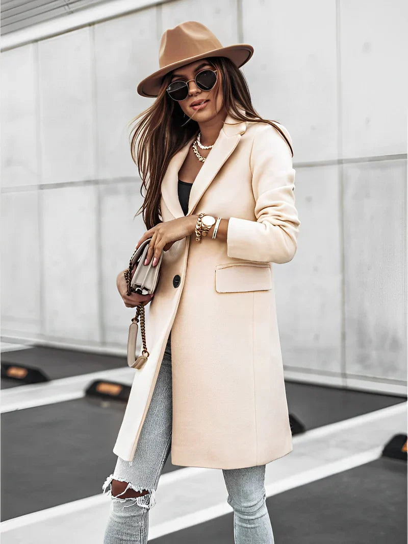 Mote oversized damekappa med V-hals, lange ermer. Perfekt for casual og spesielle anledninger.