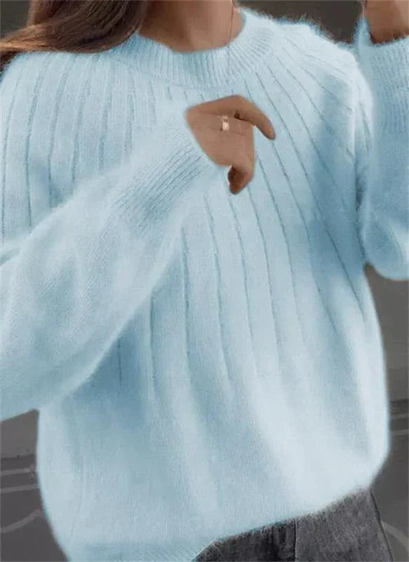 Stilig damegenser, strikket for en komfortabel og elegant vinterlook.