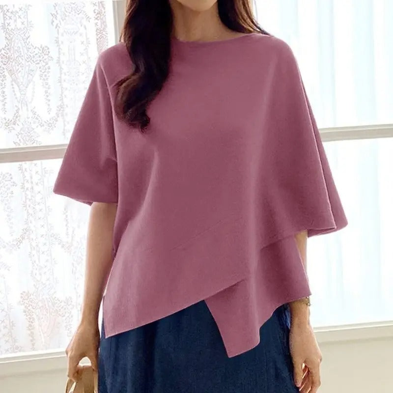 Stilfull 3/4-ermet bluse for kvinner med elegante volangdetaljer. Perfekt for vår og sommer.
