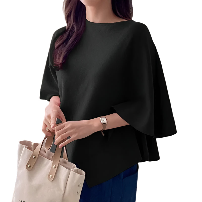 Frontbilde av en stilfull 3/4-ermet bluse for kvinner med myke volanger.