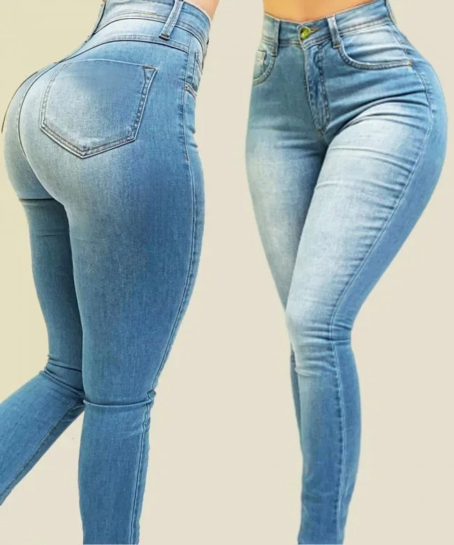 Stilige kvinner i blå høy midje shapingjeans. Komfortable skinny denim bukser som former og passer til hverdags.