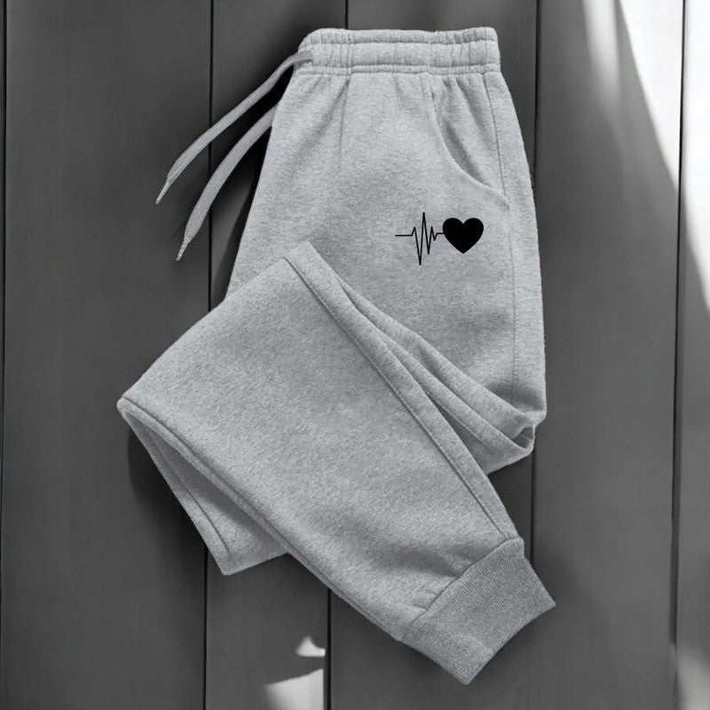 Fritidsbukser for kvinner i avslappet passform, med lommer, ideelle for en komfortabel sporty stil.