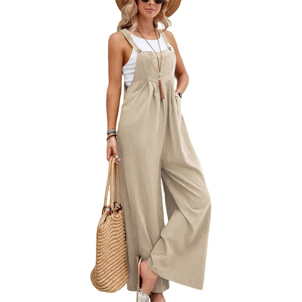 Kvinner løs baggy bib jumpsuit med brede ben. Komfortabel hverdags jumpsuit for sommerstil.