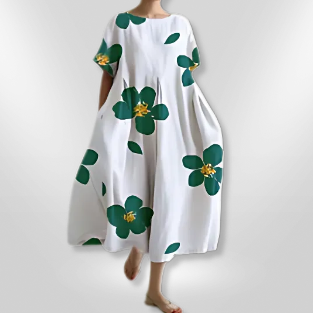 Maxikjole for kvinner, bomull med blomstermotiv, elegant og perfekt for varme dager.