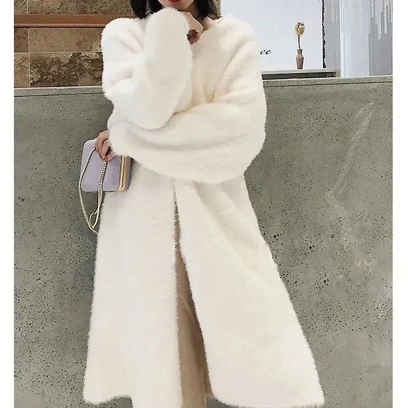 Motebevisst lang strikket cardigan for kvinner, tidløs og komfortabel, ideell for elegant vinterstil.