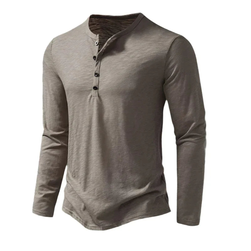 Elegant langermet herrepolo med båndkrage, perfekt for en casual og stilren look.