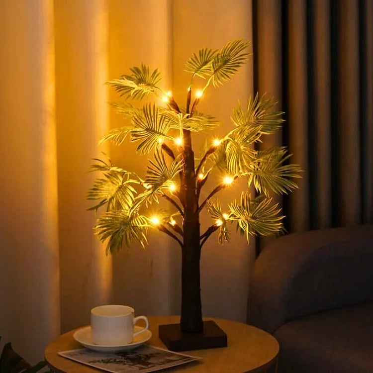 "LED-julelys med palmebladdesign, elegant og festlig dekorasjon for hjemmet, gir varm belysning og tropisk preg."