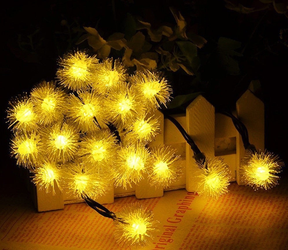 Dekorative LED løvetannblomster på solcelledrevet strenglys. Elegant hagedekor.
