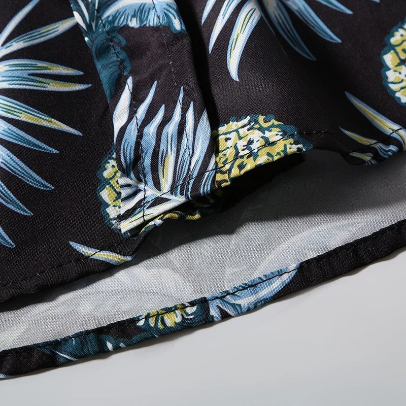Sommerskjorte for herre med kult stranddesign. Kortermet, lett og pustende. Ideell for en stilig sommer.