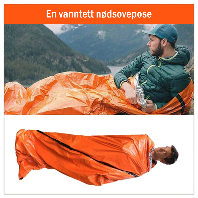 "Lett, vanntett nødsovepose i oransje Mylar som reflekterer varme, kompakt foldet for utendørs sikkerhet."