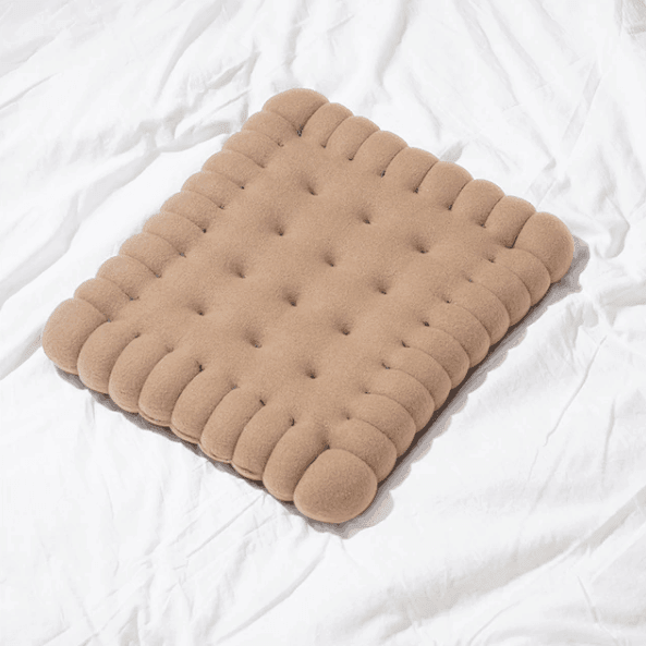 Unisex komfortpute med søtt kjeksdesign. En luksuspute som passer alle, og gir god støtte og avslapning.