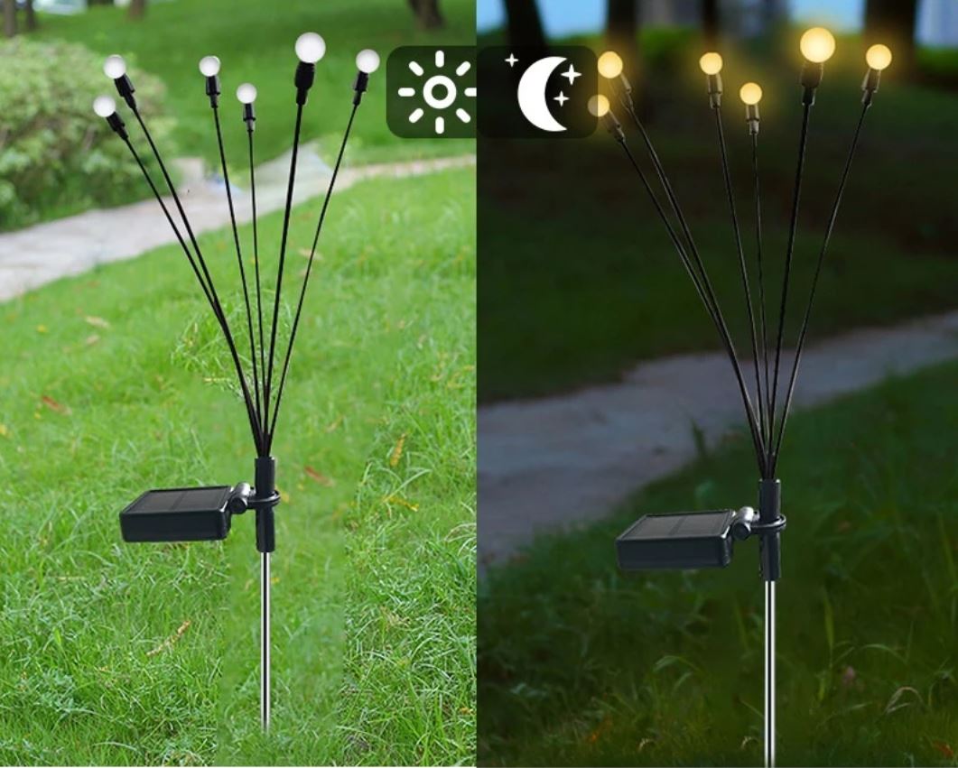 Detaljbilde av et glødende LED-ildfluelys med solcellepanel.