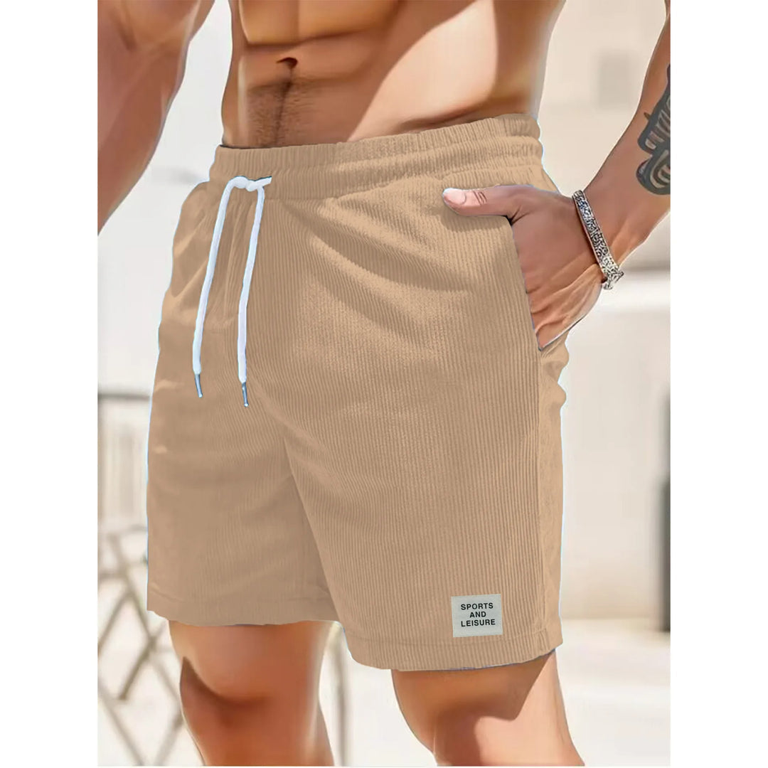 Mørkeblå menns kordfløyels shorts. Trendy casual shorts med avslappet passform for en stilig sommerlook.