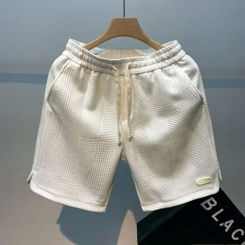 Stilige og allsidige menns sportsshorts, egnet for aktiv trening og en avslappet hverdag i varmt vær.