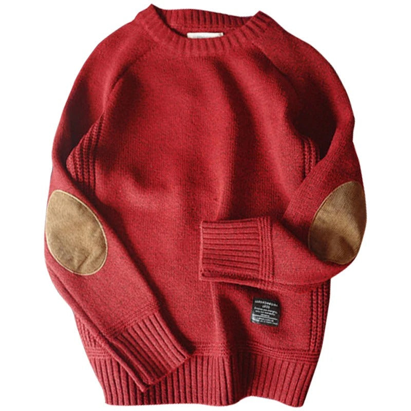 Stilfull oversized herregenser med unikt lappestrikkdesign og komfortabel rundhals.