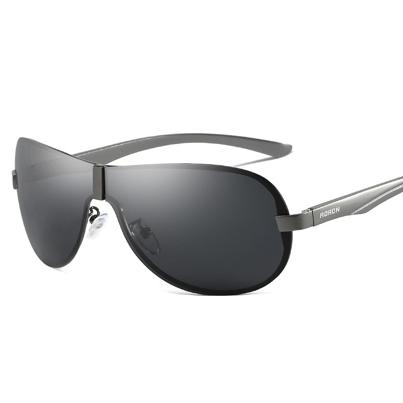 Opplev klarere syn med disse polariserte solbrillene for menn. Perfekt for sommer, med UV400 og antirefleks.