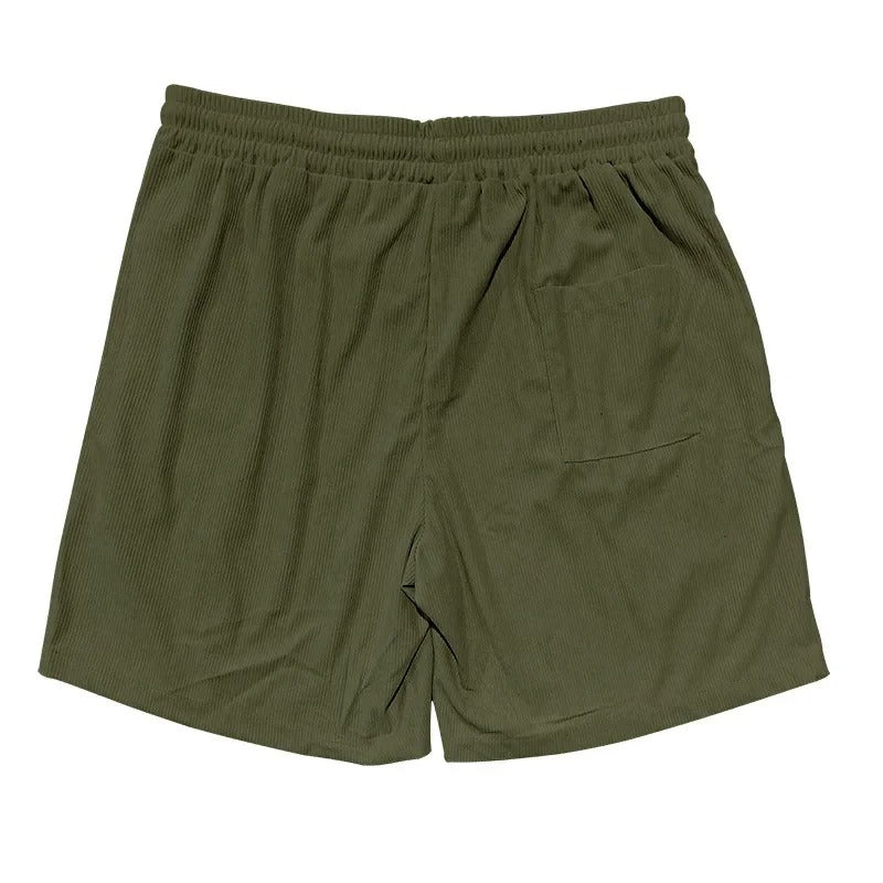 Allsidige menns retro cargoshorts i marineblå, perfekt for streetwear og sommeraktiviteter.