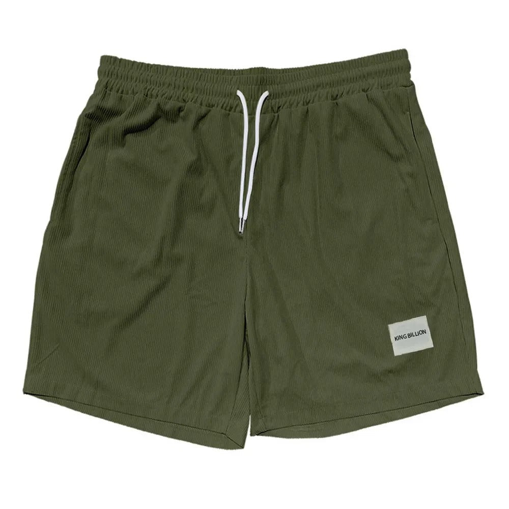 Nærbilde av metallknapper og sømmer på menns retro cargoshorts, høykvalitets tekstur.