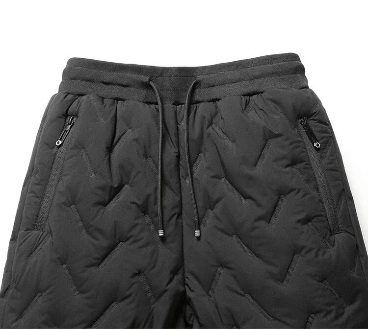 Isolerende menns vanntette joggebukse. Varm og komfortabel for vinterbruk og utendørssport.