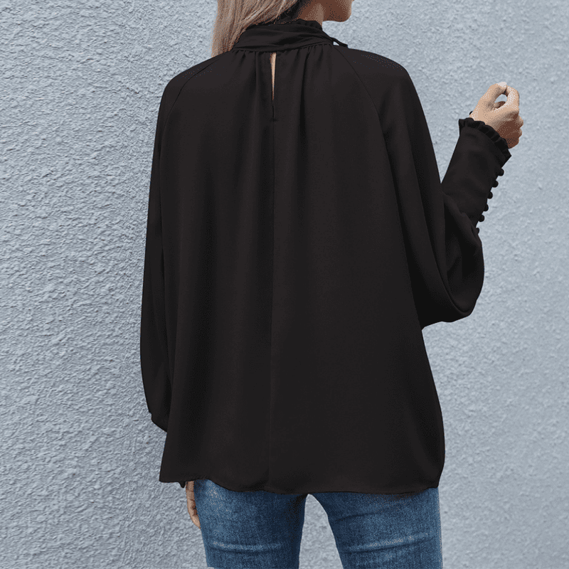 Stilig langermet bluse for kvinner, elegant og komfortabel til kontor eller hverdag. Enkel å style.