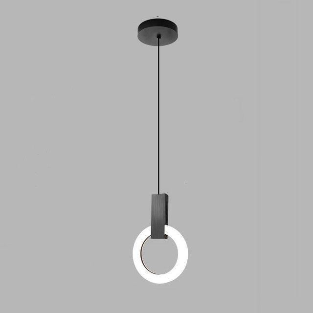 "Minimalistisk LED-pendellampe i sirkulær design, gir varm belysning med nordisk eleganse, ideell for moderne rom."