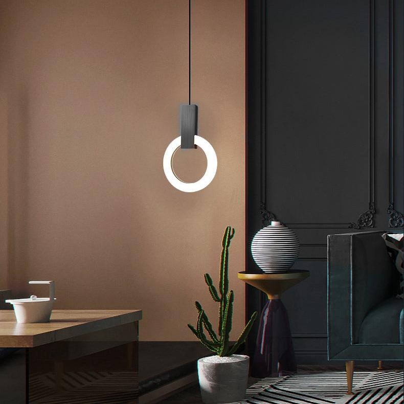 "Minimalistisk LED-pendellampe i sirkulær design, gir varm belysning med nordisk eleganse, ideell for moderne rom."
