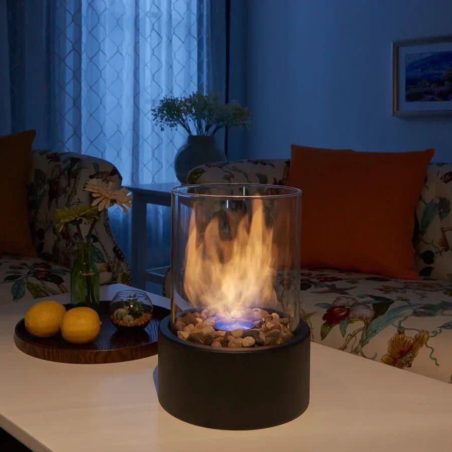 Bærbar bordpeis i svart metall, egnet for både innendørs og utendørs bruk, røykfri peis
