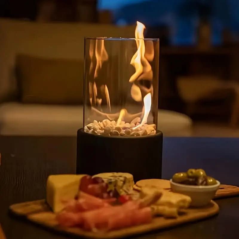 Bordpeis i glass og stål, enkel å flytte, gir varme og stemning utendørs, moderne stil
