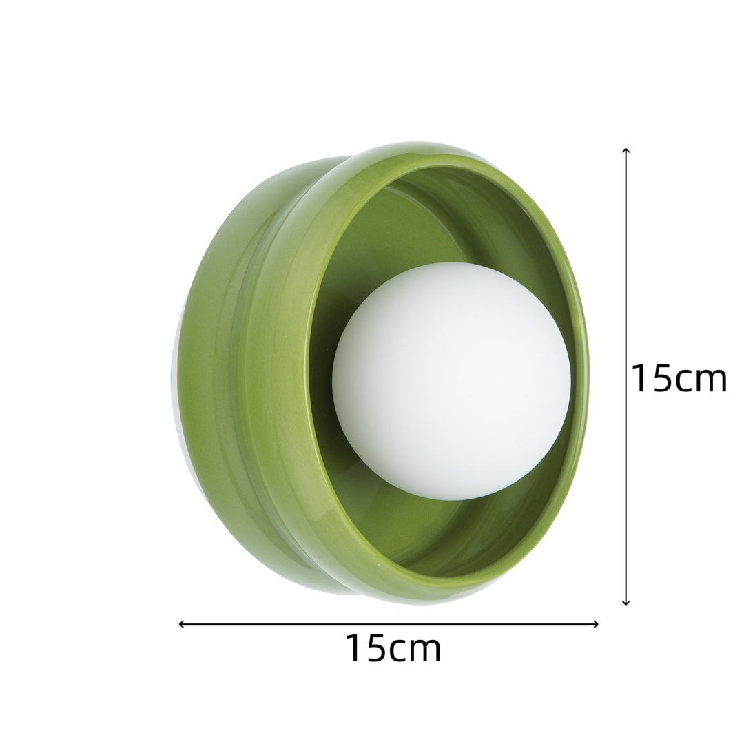 Allsidig rund vegglampe, passer i stue og soverom. Moderne design med stemningsfull belysning.