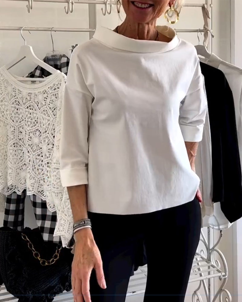 Pustende dame topp, moderne design med høy krage. Allsidig og elegant for både fest og hverdag.
