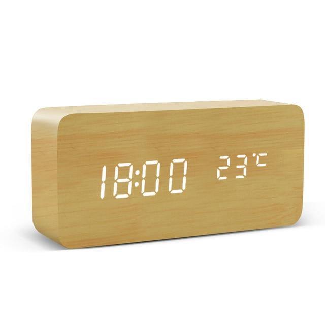 Stilren, moderne digital vekkerklokke i minimalistisk design, ideell for et moderne interiør.