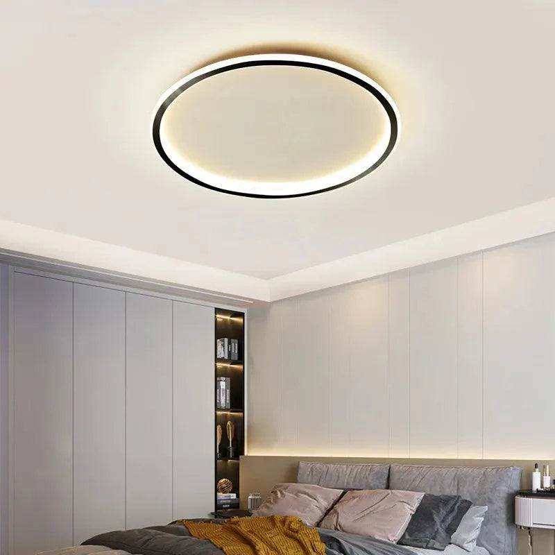 Grå taklampe med moderne minimalistisk design; elegant takbelysning for stue eller spisestue.