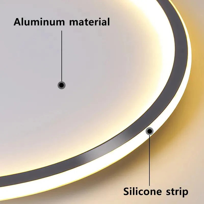 Taklampe i minimalistisk stil; moderne grå LED-belysning for stilrent hjem og interiørdesign.