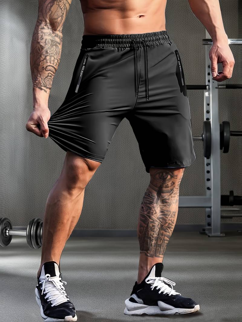 "Moderne grå og svarte Gymfit Premium shorts, frontvisning, designet for komfort og fleksibilitet under trening."