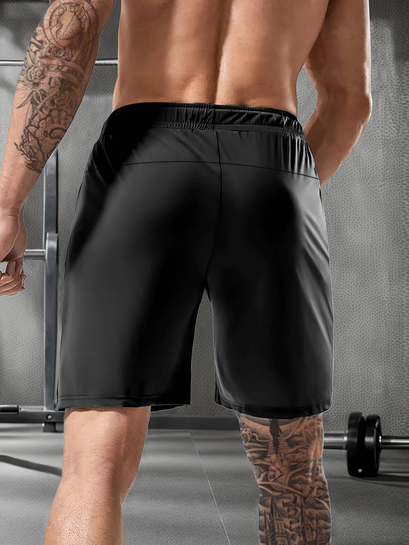 "Moderne grå og svarte Gymfit Premium shorts, frontvisning, designet for komfort og fleksibilitet under trening."