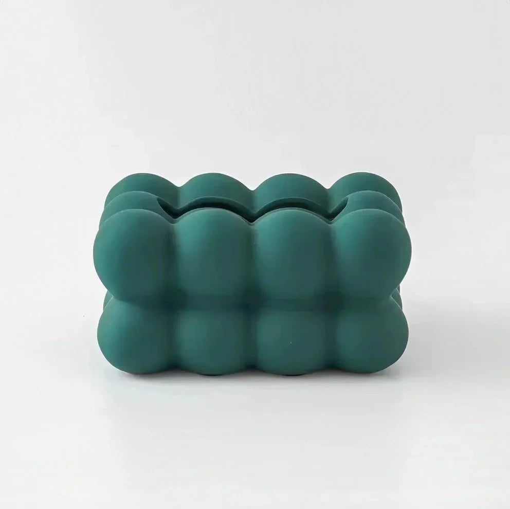Elegant keramisk papirholder med minimalistisk design. Perfekt hjemmedekor for moderne interiør.