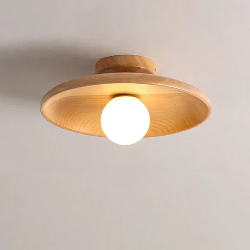 Moderne taklampe i kuleform, et tidløst designelement for hjemmets innredning.