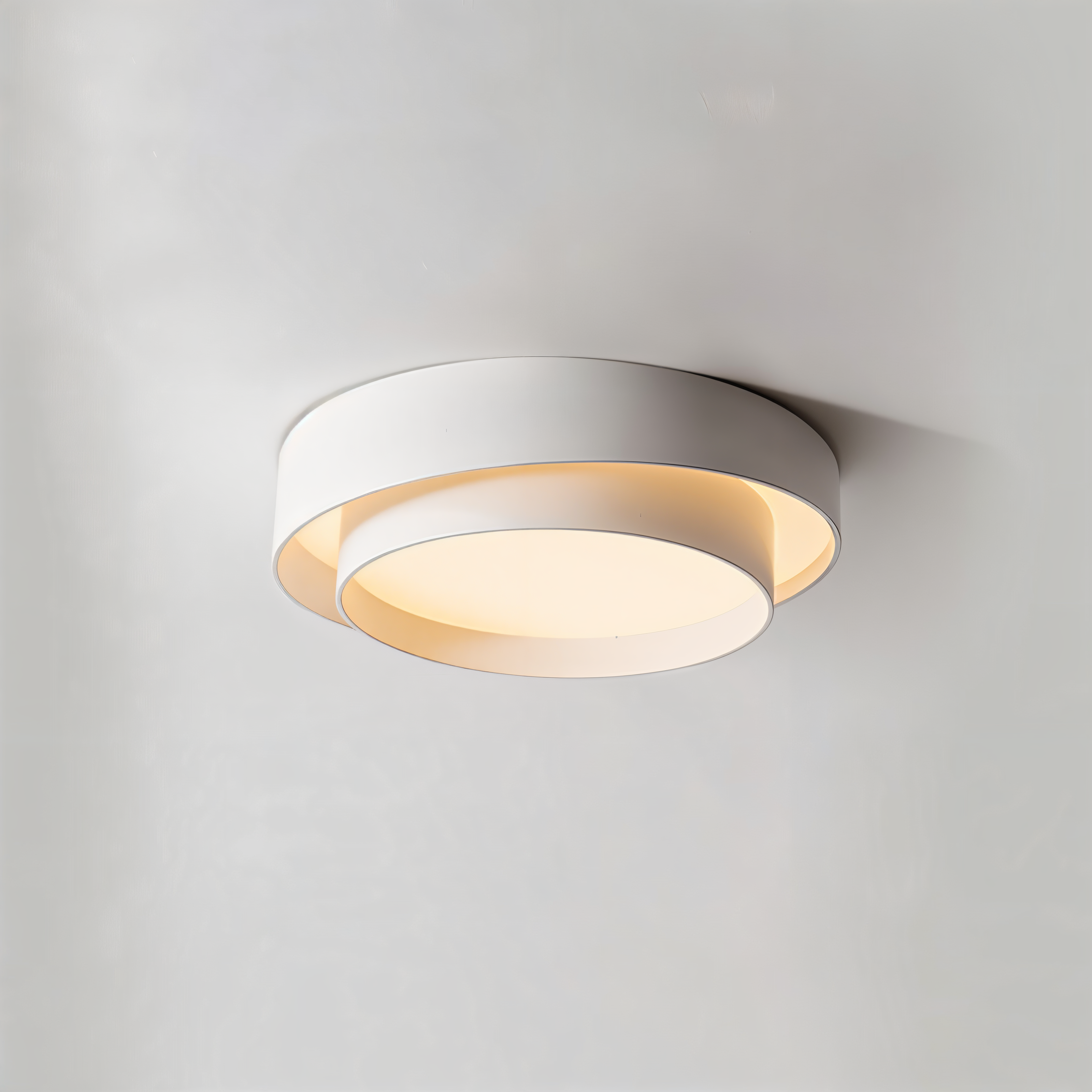 Moderne LED taklampe i minimalistisk stil. Elegant dobbeltlags design for stilren innredning.