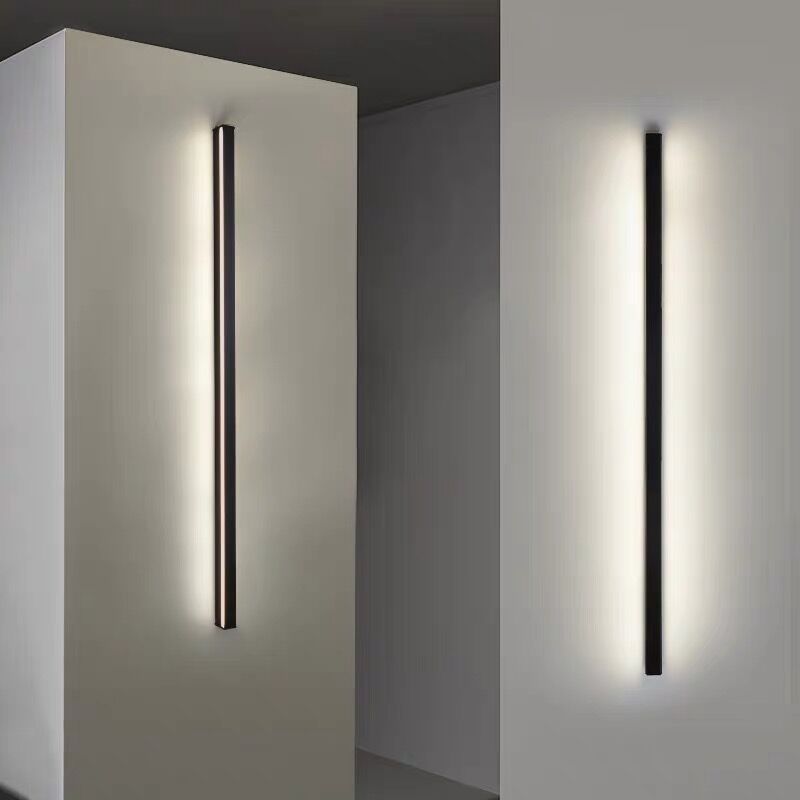 Enkel og stilren LED vegglampe i minimalistisk design. Ideell for moderne innendørs belysning.
