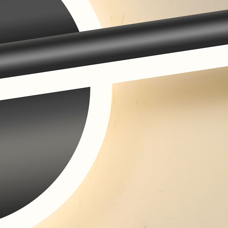 "Moderne LED vegglampe med rund og firkantet design, laget av metall og silikon, energieffektiv og stilfull."