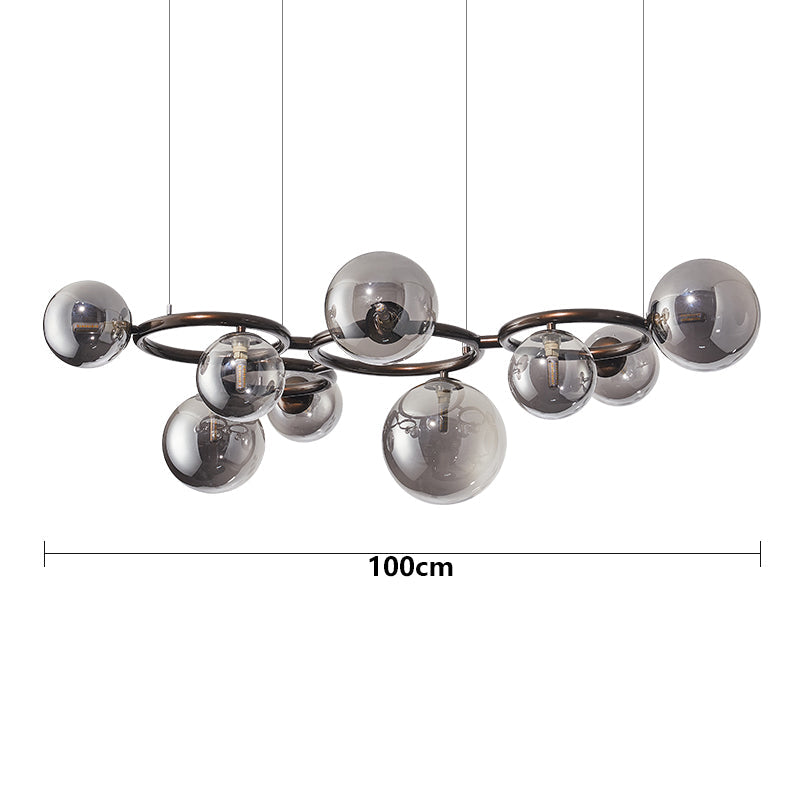 "Moderne spisebordslampe med tre justerbare ringer, stilrent design og holdbar kvalitet for minimalistisk interiør."
