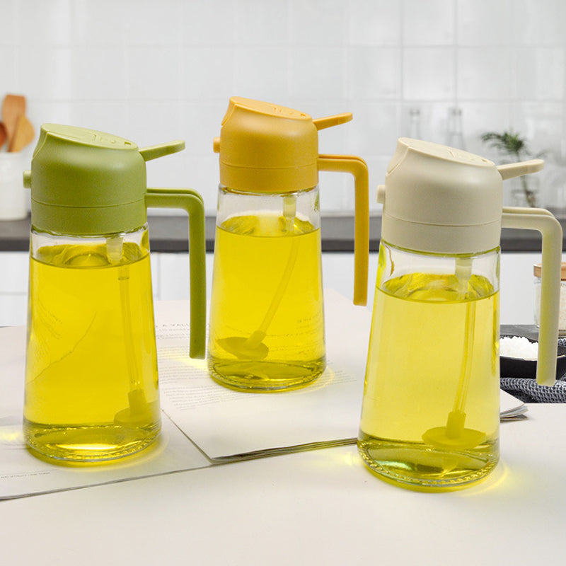 "Multifunksjonell glass oljesprøyte og dispenser; elegant design, 470 ml kapasitet, rustfritt stål detaljer."