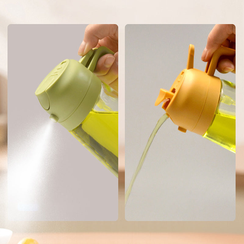 "Multifunksjonell glass oljesprøyte og dispenser; elegant design, 470 ml kapasitet, rustfritt stål detaljer."