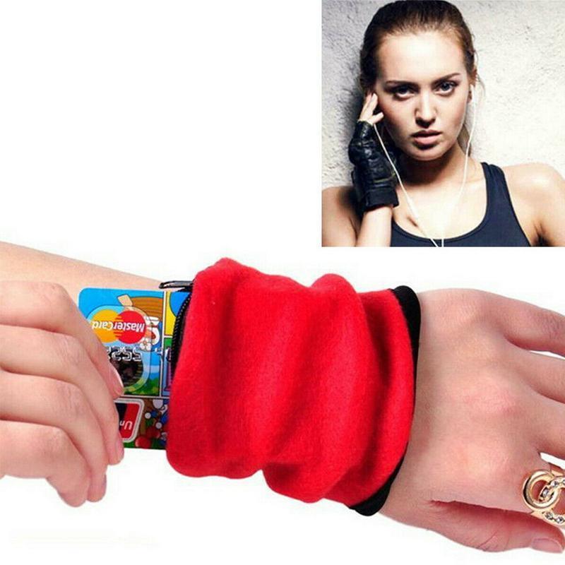 "Multifunksjonell håndleddpose for trygg oppbevaring, svart kompakt design, perfekt for sport og reise, holder verdisaker sik
