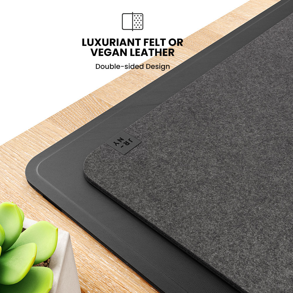 Ergonomisk skrivebordsmatte som kombinerer filt og vegansk skinn med innebygd lader for ryddig arbeidsplass