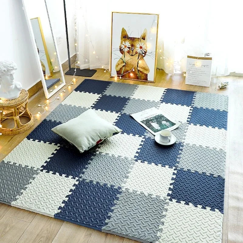 Babymatte i puslespilldesign; sikker, miljøvennlig og myk for trygge krabbetimer.