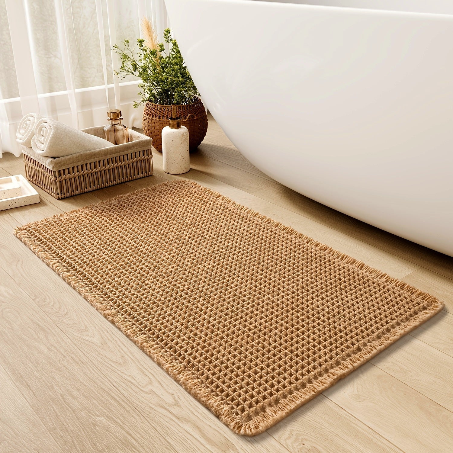 Komfortabel badematte med elegant vaffeldesign. Sklisikker for trygghet på baderomsgulvet i grønn eller hvit.