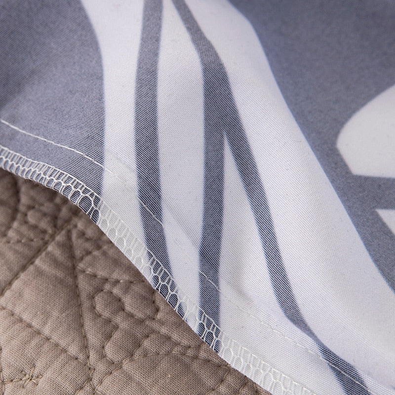 Nærbilde av et hodeskalle-motiv på det stilige sengesettet. Polyester komfort og unik design.