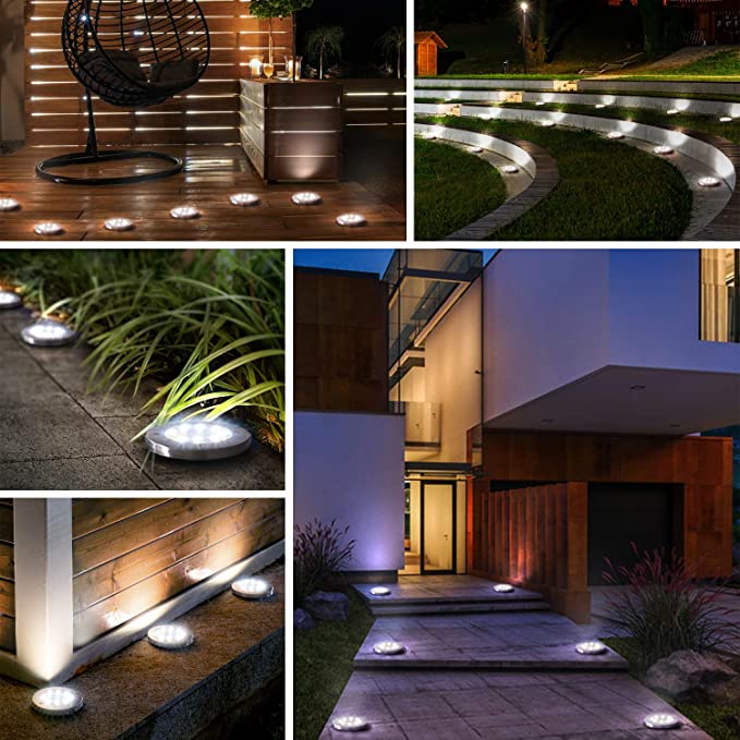 Solardisk lys med 8 LED plassert langs en hagegang, gir varm og sikker utendørsbelysning. Perfekt for oppkjørsel.