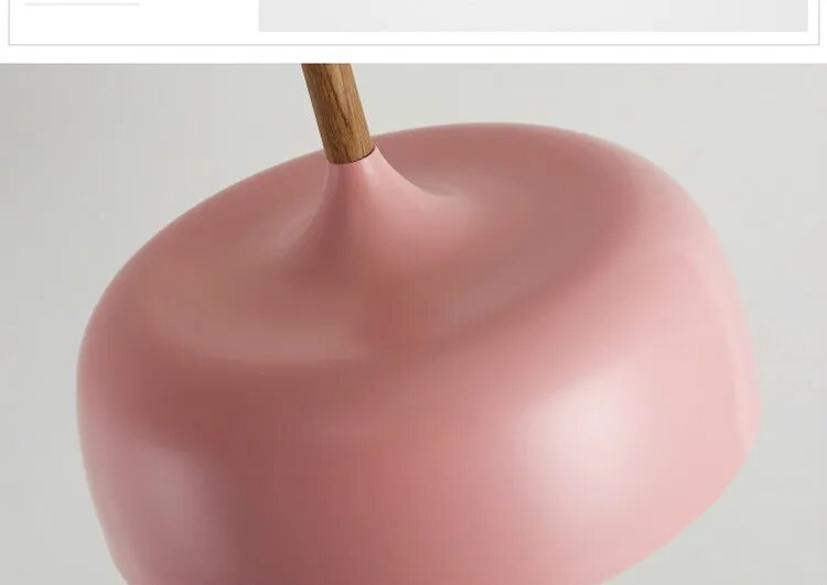 "Nordisk LED-pendellampe med elegant design, tilgjengelig i flere farger som hvit, svart, grønn, blå, gul og rosa."